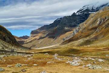 Bright winter day with a backdrop of beautiful clouds blanketing the mountain