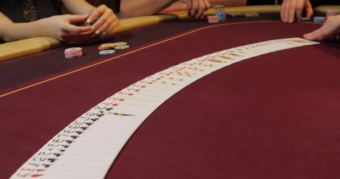Casino Poker table with chips and cards, shallow depth of field