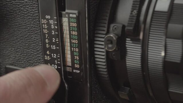 operating a vintage analogue 120 medium format film camera