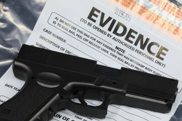 Criminals weapon and a CSI evidence bag