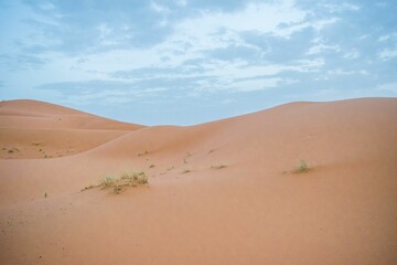 Sand dunes during sunset in Erg Chebbi desert, near Merzouga, Sahara Desert, in Morocco.