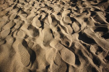 High angle shot of a sand dune textural background