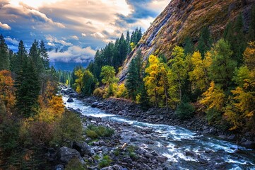 a beautiful mountain river in the fall with trees and clouds in North Central Washington