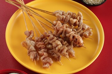 Sate taichan is a variation of chicken satay grilled and served without peanut or ketjap seasoning...