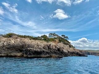 Fototapeta na wymiar Beautiful shot of scenic rocky cliffs on the shore of Ibiza