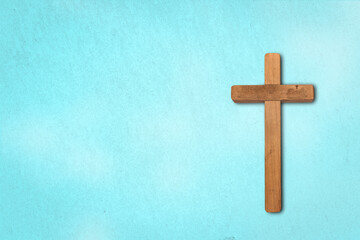 Classic wood carved a cross on the blue background