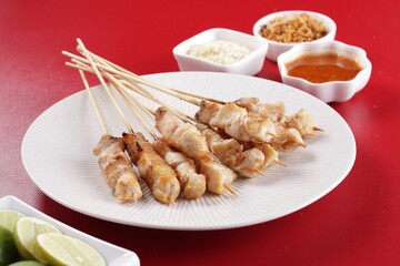 Sate taichan is a variation of chicken satay grilled and served without peanut or ketjap seasoning unlike other satays. It is served with sambal and squeezed key lime,