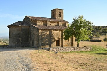 Fototapeta na wymiar Scenic view of an old stone church in green mountains
