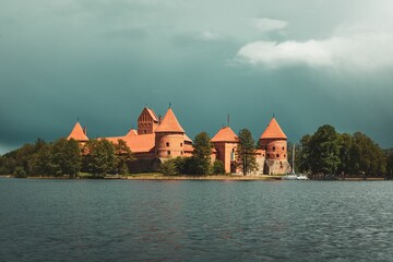Naklejka na ściany i meble Aerial view of Trakai Island Castle on the shore of Lake Galve in Trakai, Lithuania