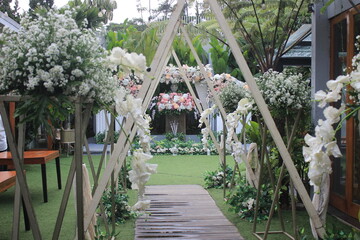 wedding altar and row of brown and white chairs shot at low angle prepared