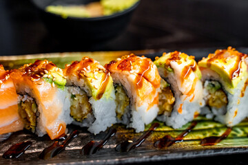 Close-up of Rainbow rolls in the Japanese restaurant. 