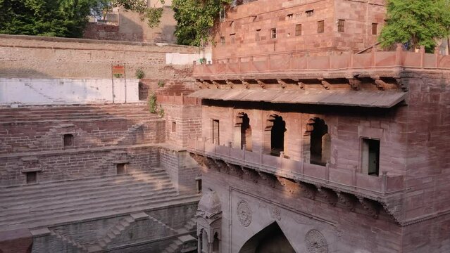 ancient red stone unique stepwell architecture at day from different angle angle