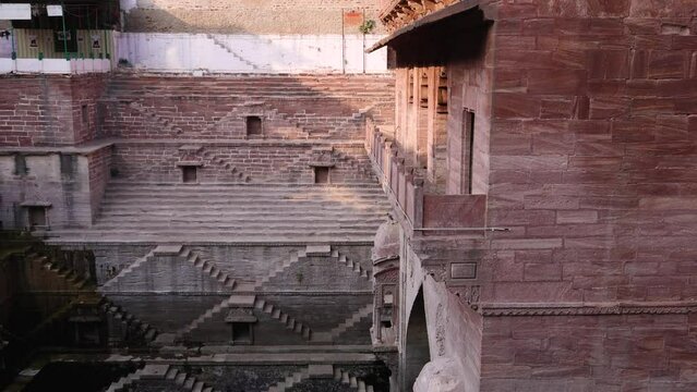 ancient red stone unique stepwell architecture at day from different angle angle