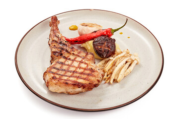 Pork chop steak (tomahawk) served with shimeji mushrooms, shiitake mushrooms, garlic and grilled...