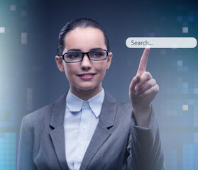 Search concept with businessman pressing button