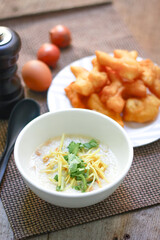 Congee and fresh ginger on top.