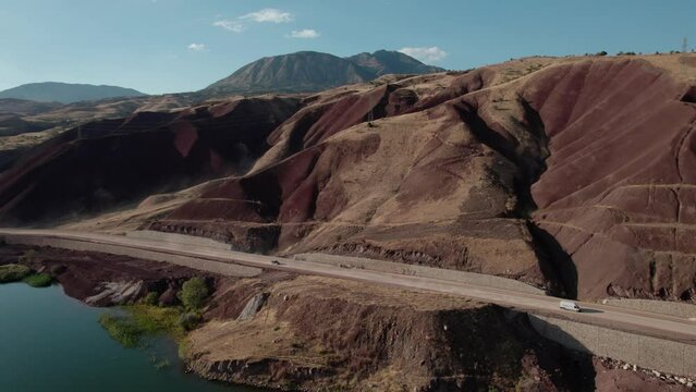 River canyon aerial view, stunning red mountains around wide river lake. Drone video 4k