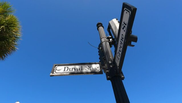 Duval Street and Greene St signs, Key West against blue sky, Florida