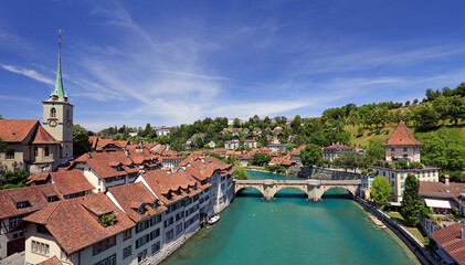 Fototapeta na wymiar View of the Bern old city center and Nydeggbrucke bridge over river Aare, Bern, Switzerland