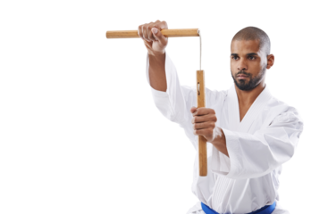 Karate, discipline and a man training with nunchucks isolated on a transparent background for self defense. Fitness, sports or weapon with a young athlete on PNG to practice for a combat competition