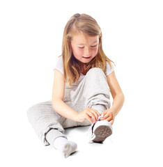 Tie, girl on the floor or kid with shoelace, relax or travel with preparation, comfort or calm....