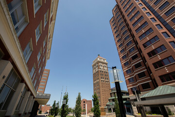 Afternoon sunlight shines on the historic buildings of the downtown skyline of Bartlesville,...