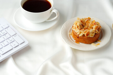 Close up of tartlet with almond petals