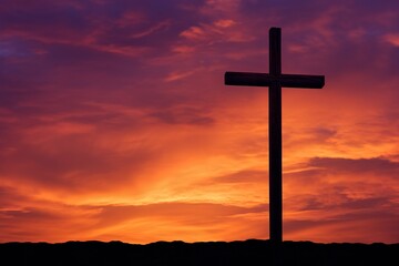 Concept or conceptual wood cross or religion symbol shape over a sunset sky background banner