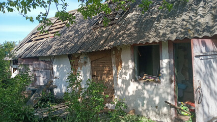 Fototapeta na wymiar a Russian bomber dropped bombs on a civilian house , Ukraine wooden house .