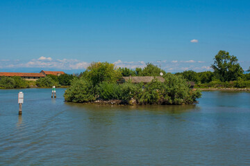 A traditional casone fisherman's hut on an island in the Grado section of the Marano and Grado Lagoon in Friuli-Venezia Giulia, north east Italy. August.