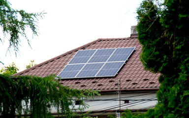 Installing a Solar Cell on a Roof.