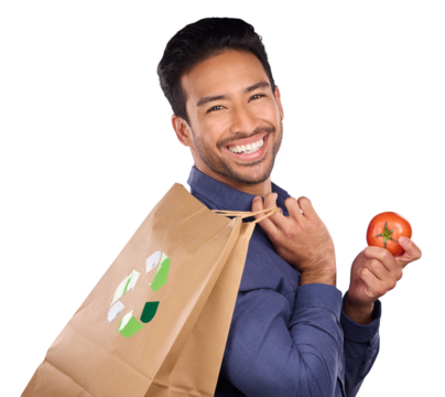 Portrait, smile and grocery shopping with a man isolated on a transparent background for health, diet or nutrition. Face, smile and tomato with a happy young supermarket customer on PNG for recycling