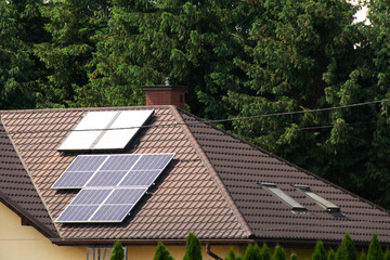 Installing a Solar Cell on a Roof.