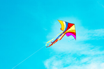 Colorful kite flying freely in the wind