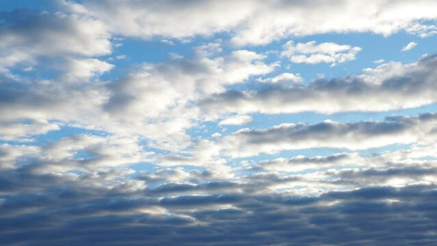 Altocumulus high cumulus heaped cloud genus that belongs mainly to stratocumuliform. Globular masses or rolls in layers or patches. Cumuliform stratocumuliform clouds, altocumulus signifies convection