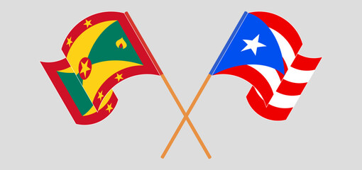 Fototapeta na wymiar Crossed and waving flags of Grenada and Puerto Rico