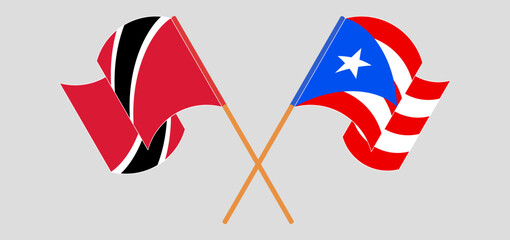 Crossed and waving flags of Trinidad and Tobago and Puerto Rico