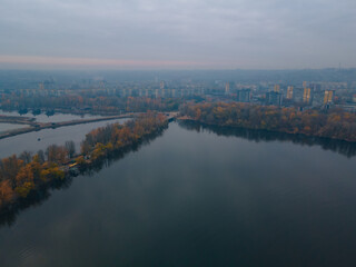 The rowing canal spit on Pobeda in the city of Dnieper from above. River View. Autumn colors. Drone...