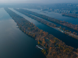 The rowing canal spit on Pobeda in the city of Dnieper from above. River View. Autumn colors. Drone...