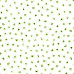 Seamless pattern with green small flowers