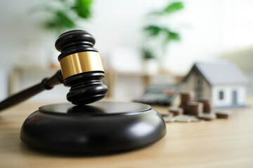 Judge Auctions and the Real Estate Legal System House model and hammer with icons on wooden table Laws governing foreclosures and bankruptcies, debts, or encumbrances. - obrazy, fototapety, plakaty