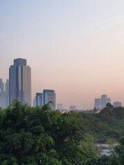 Fototapeta na wymiar Jakarta, Indonesia – October 18, 2023: A sunrise view cityscape of Indonesia capital city Jakarta
