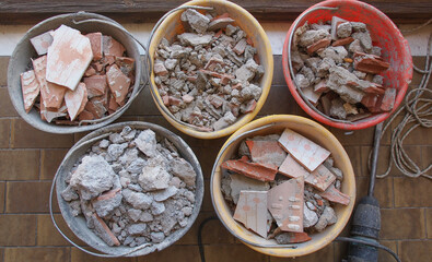 bucket full of demolition rubble