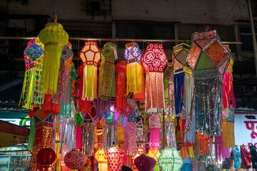 Fototapeta premium Mumbai , India - 7 November 2023, Kandil paper lanterns are hung for sale during Diwali festival at malad west Mumbai India