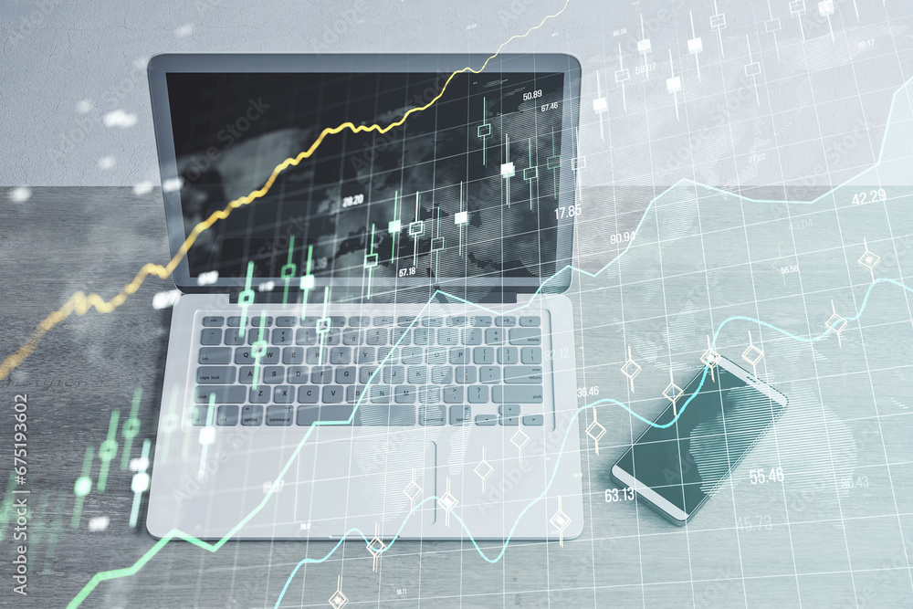 Poster top view of laptop on desk with cellphone and glowing forex chart and grid on blurry background. sto