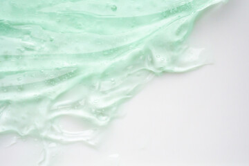 Transparent clear green liquid serum gel cosmetic texture background