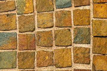 Paving slabs of various colours and shapes.