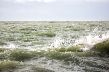 stormy wave crashing in the sea