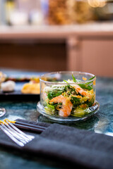 salad with shrimp, avocado, fresh cucumber, sweet pepper and tomato