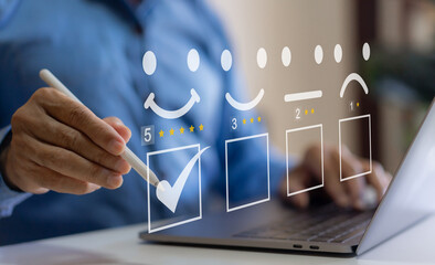 Human use laptop showing give feedback icon satisfaction survey, five star, customer, satisfaction,...